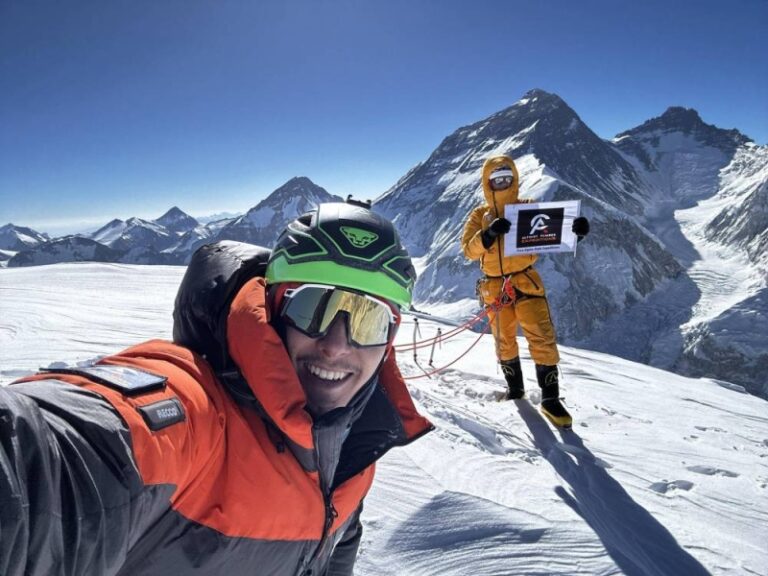 Two mountaineers enjoy alpine style climbing on Mt Pumari