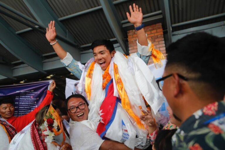 Record-holding Nepali climbers receive hero's welcome after conquering final 8,000-meter peak