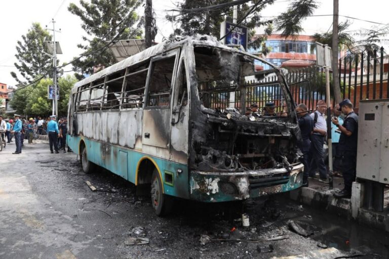 Bus catches fire in Tripureshwor, driver injured